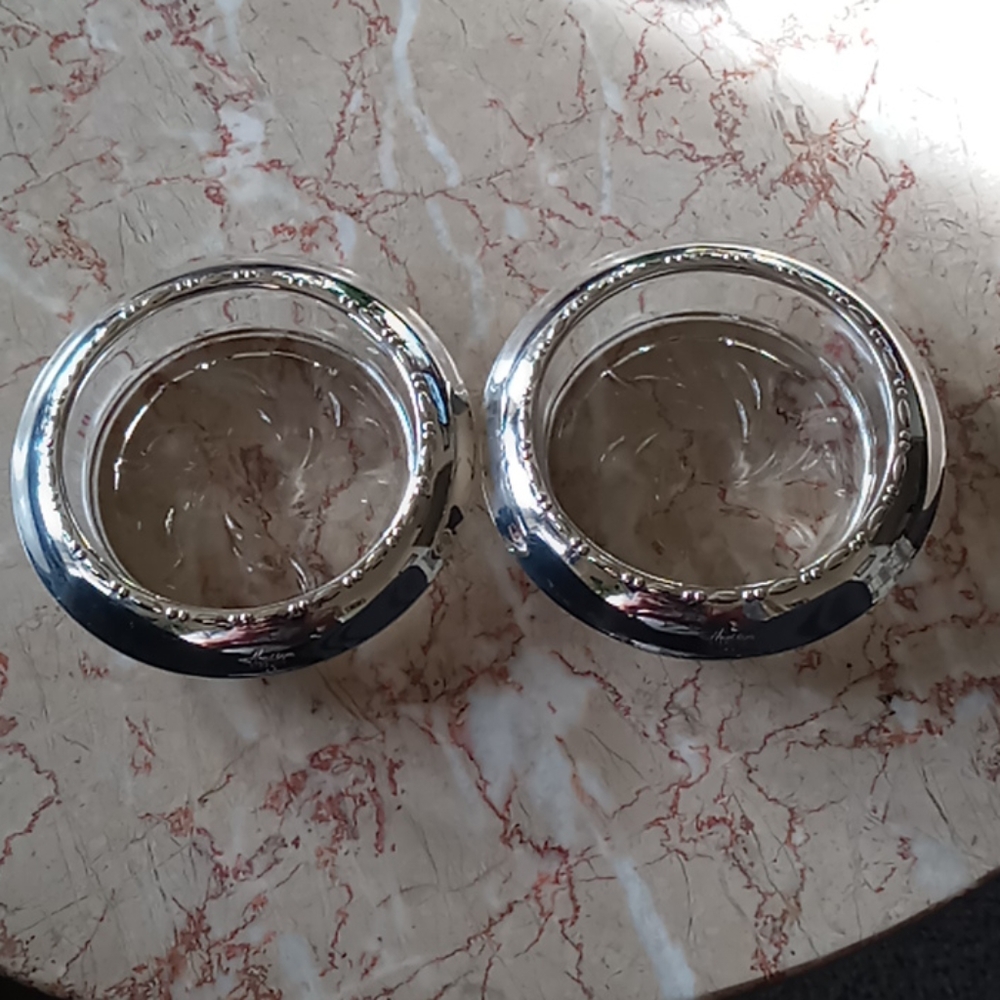 Sterling and glass coasters.